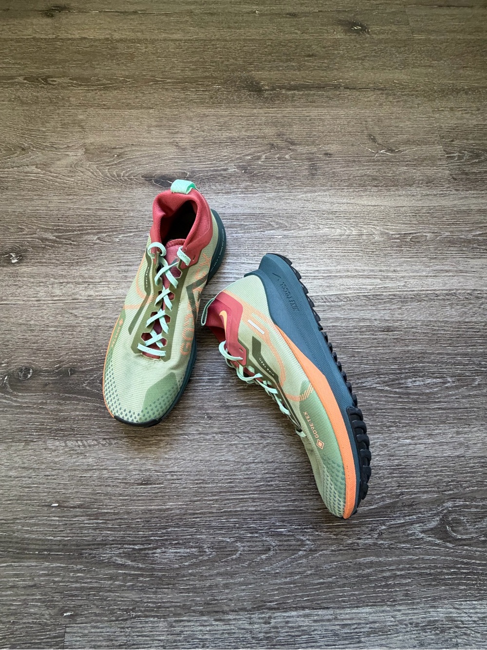 Nike Man Sneakers in Sage Green & Coral Accent